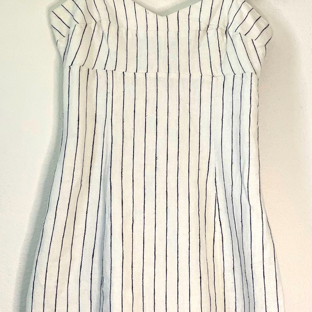 Striped white sheen dress XS and floral off shoulder black dress.